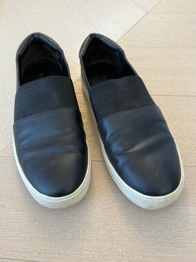 Women’s Black Slip-On Leather Sneakers with White Sole